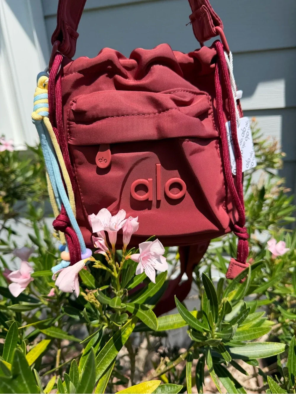 ALO Yoga Burgundy  Drawstring Mini Bucket Bag with Multicolor Cord Tassels